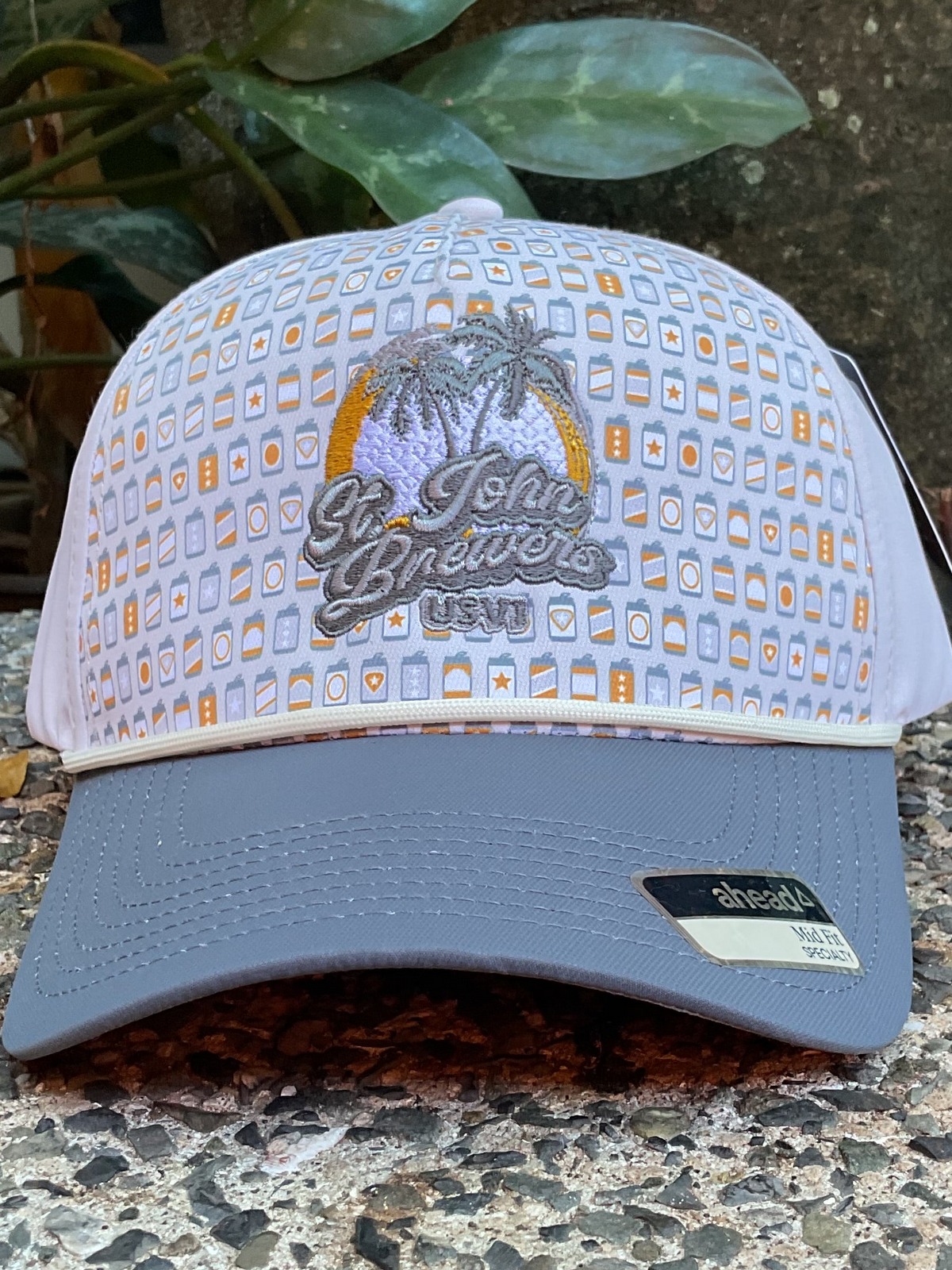 Cap with St. John's Brewers logo on a textured surface
